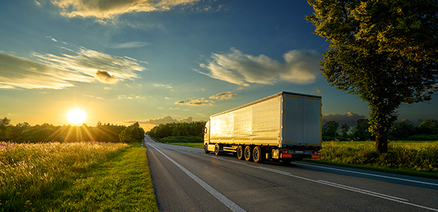 truck driving down the road