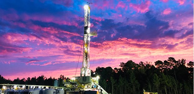 Drilling rig during sunset