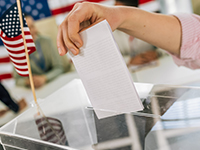 ballot going into ballot box