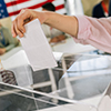 ballot going into ballot box