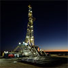 drilling rig at night